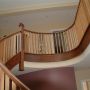 walnut and oak closed string curved stairs